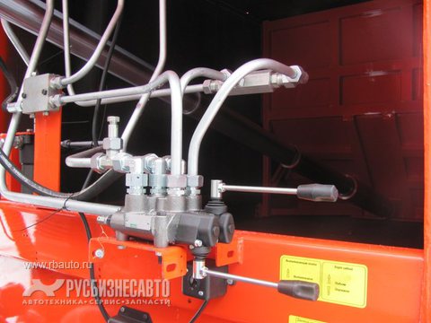 Коммунальная техника Мусоровозы и мультилифты Мусоровоз КО-427-42 с порталом Фото 7
