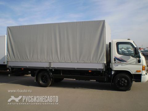 Фургоны и бортовые Бортовые и тентованные автомобили Hyundai HD-78 Бортовой тентованный (6,2 м) Фото 3